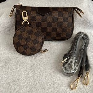 Small luxury inspired pouch with strap and round case.